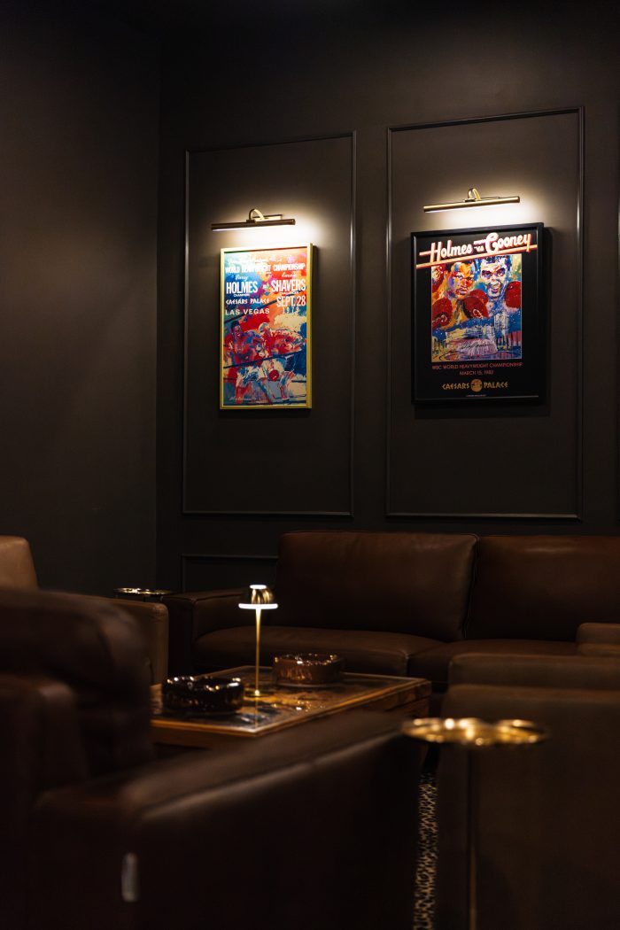 Framed posters above the lounge seating
