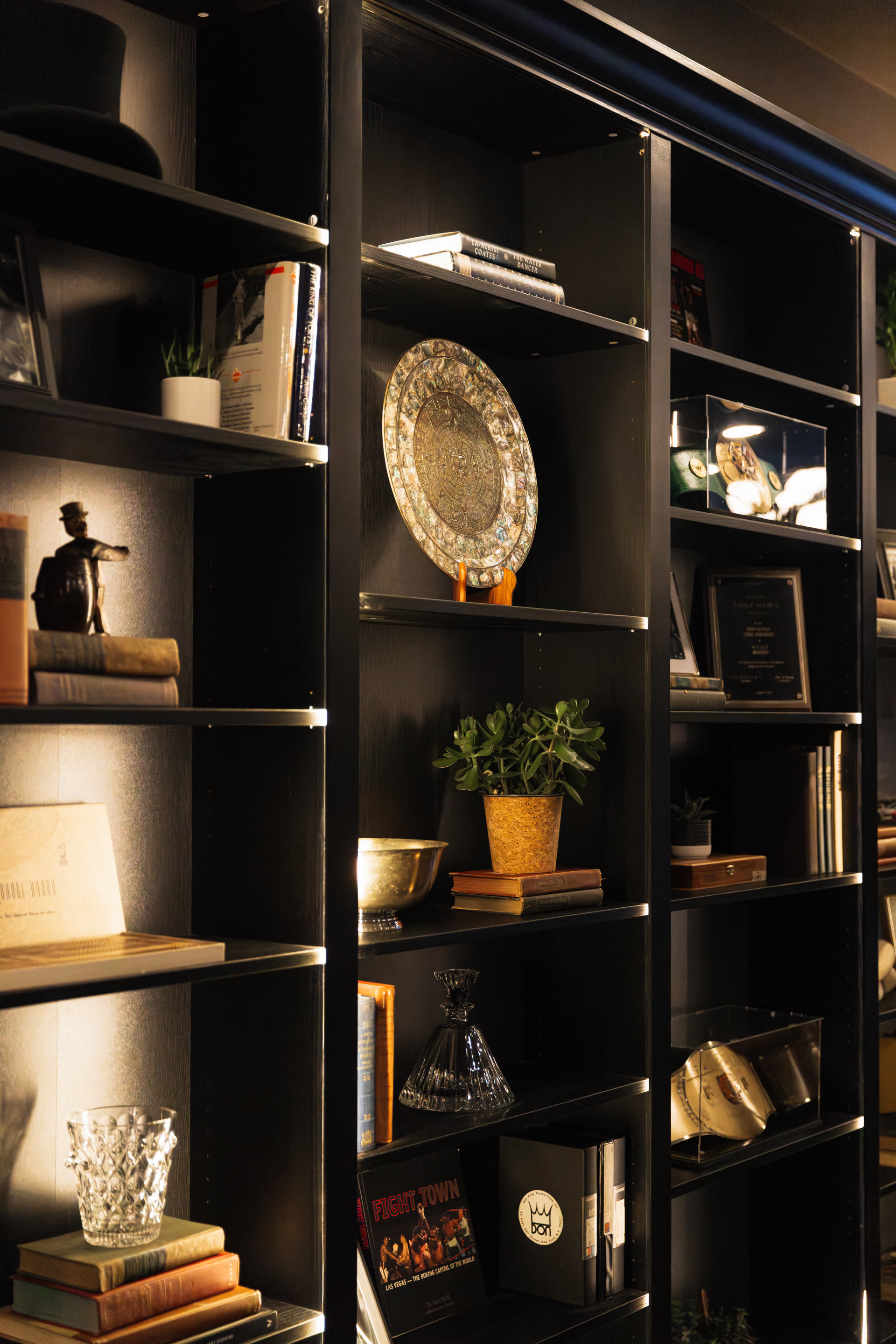 Curated bookshelf in the members' lounge